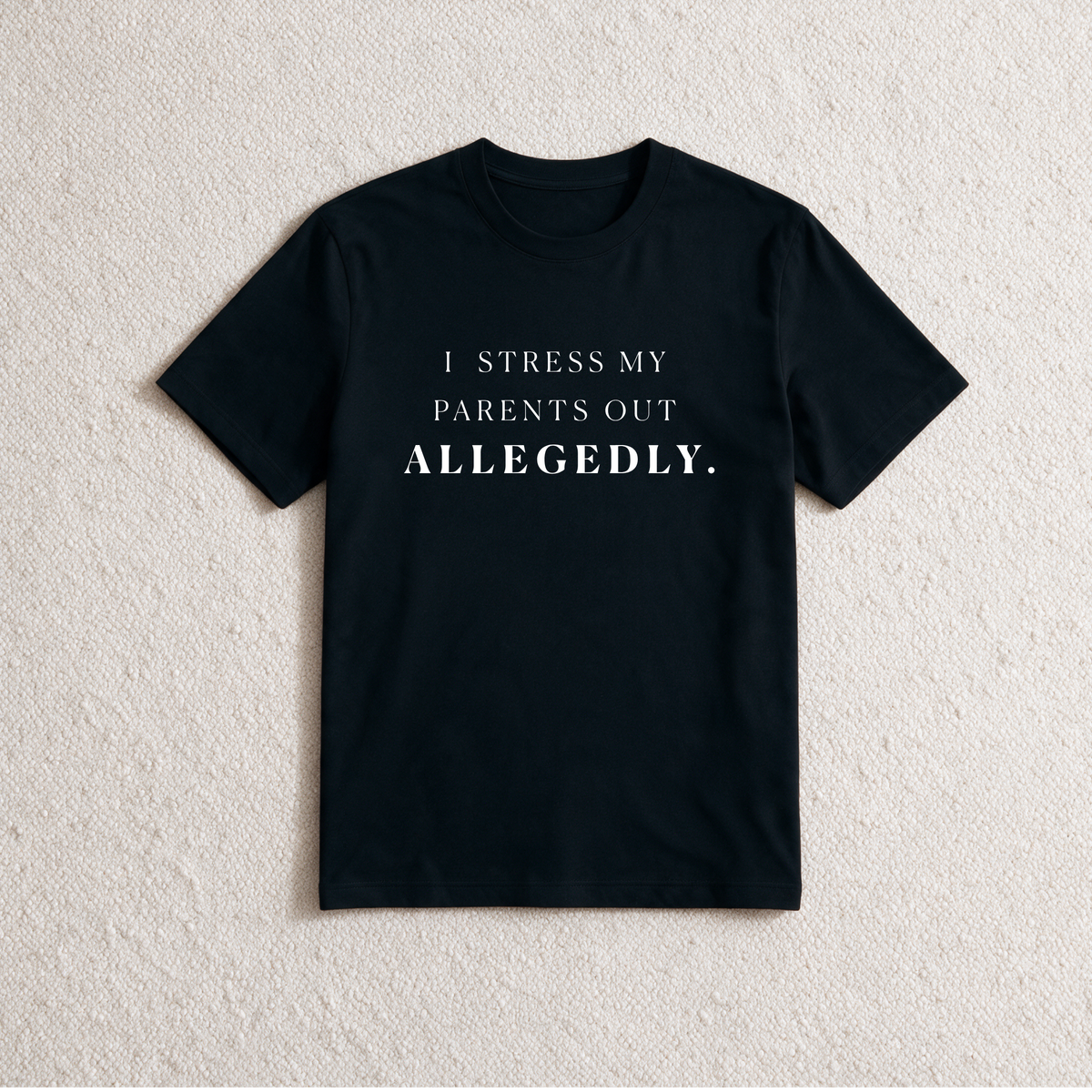 Black I Stress My Parents Out Allegedly slogan T-shirt, flat lay